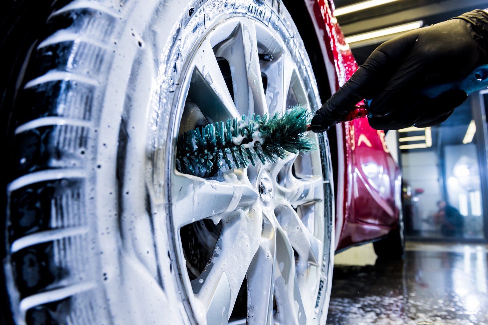 cleaning-car-wheel-with-brush-water-4-scaled-1.jpg